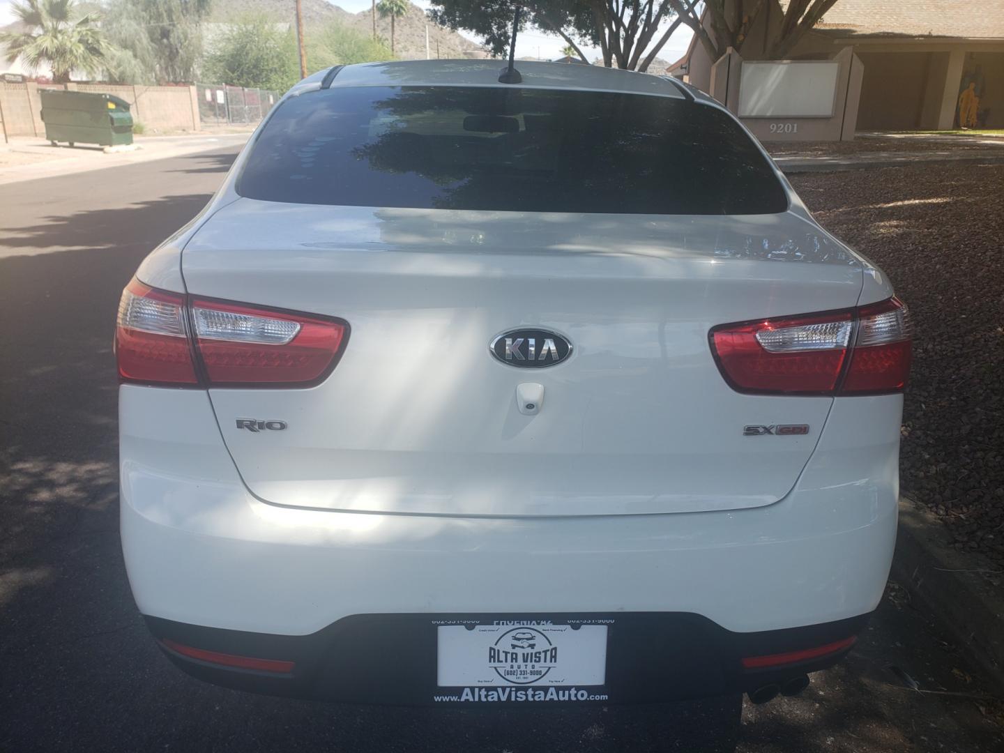 2013 Kia Rio ex (KNADN4A33D6) with an 1.6L L4 DOHC 16V engine, 6-Speed Automatic transmission, located at 323 E Dunlap Ave., Phoenix, AZ, 85020, (602) 331-9000, 33.567677, -112.069000 - 2013 Kia Rio EX,......A Must See!!... No accidents,.... Ice cold AC. The car is gorgeous inside and out. Power windows, Power door locks, Stereo/ CD Player, Phone sync, Bluetooth, Backup camera, Satellite compatible, navigation, Beautiful Black interior with Black leather seats in near perfect condi - Photo#7